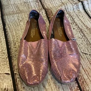 Tom’s pink glitter slip on shoes. Y-3.5/W-5-5.5